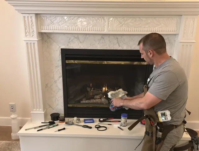 Wellington Chimney Sweep performing fireplace maintenance in Wellington, FL